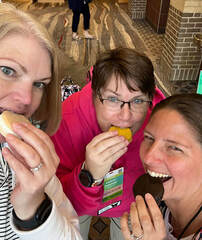 Paige, Cathy & Kristie biting into Moon Pies