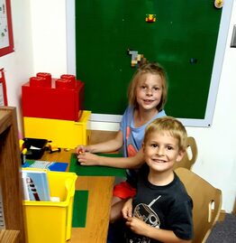 Jesse Hirte and her brother, Gatlin, play with Legos in the new Lego Makerspace at the Niagara Public Library.