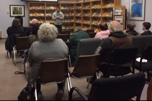 Nickolas Butler speaking with patrons at Shawano County Library
